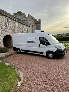 A fleet of OnThyme Logistics' temperature-controlled vehicles ready for dispatch across the UK, ensuring the safe transport of temperature-sensitive goods.