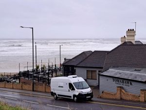 On Thyme Logistics parked in Morpeth with coastal view